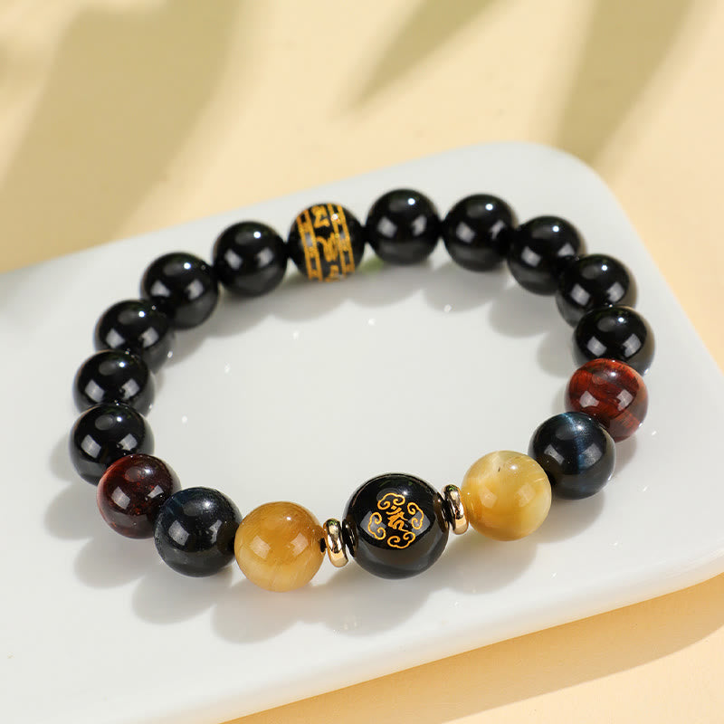 Black Onyx Tiger Eye Natal Buddha Bracelet - blue tiger eye, gold cylindrical charm