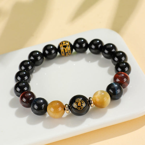 Black Onyx Tiger Eye Natal Buddha Bracelet - blue tiger eye, gold cylindrical charm