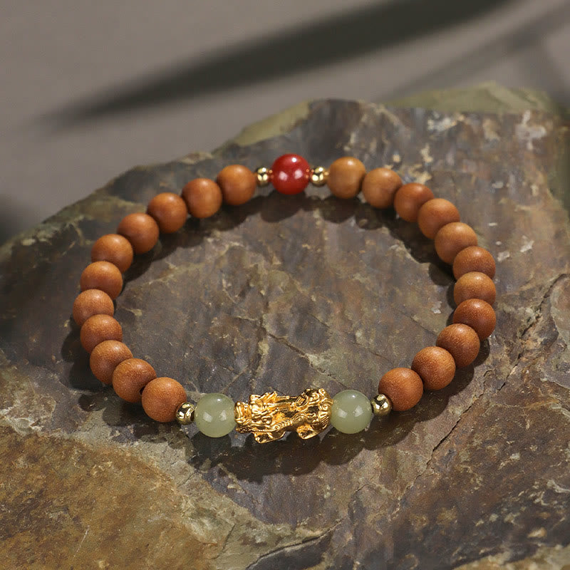 Multi-Wood PiXiu Bracelet – Light brown wood beads with gold PiXiu and green jade on natural stone, wealth jewelry