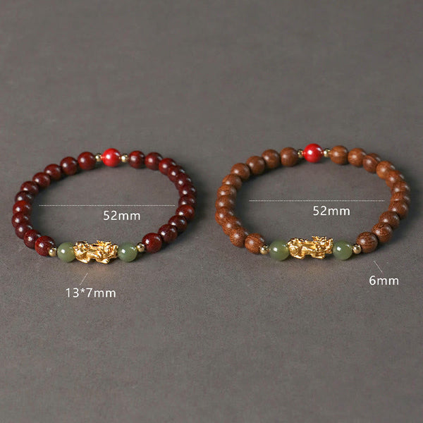 Multi-Wood PiXiu Bracelet – Two bracelets side by side with size chart 52mm diameter and 6mm beads
