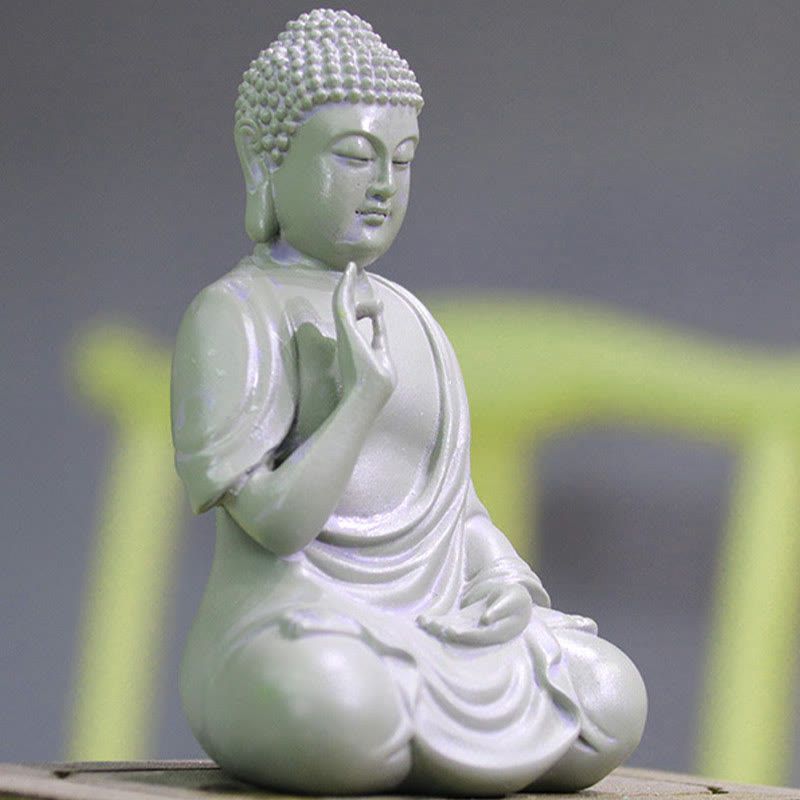 Small Meditation Prayer Resin Buddha Statue – side profile showing seated lotus posture and robe draping folds