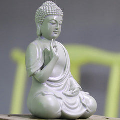 Small Meditation Prayer Resin Buddha Statue – side profile showing seated lotus posture and robe draping folds