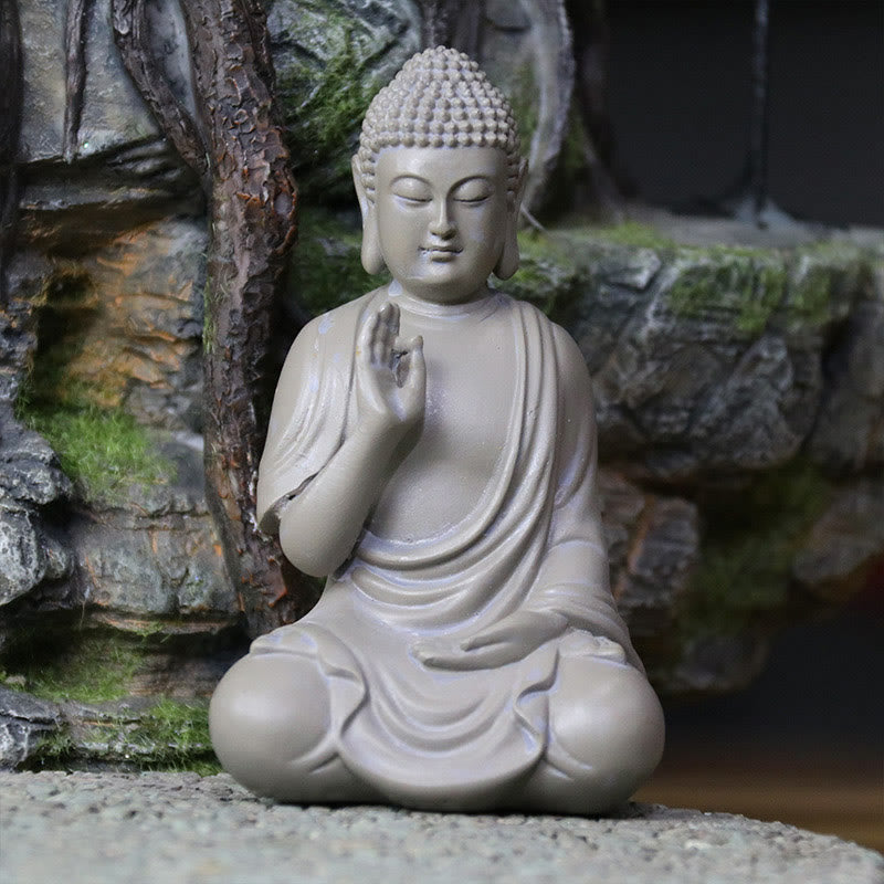 Small Meditation Prayer Resin Buddha Statue – prayer hands close-up showing fingertip precision and palm together gesture