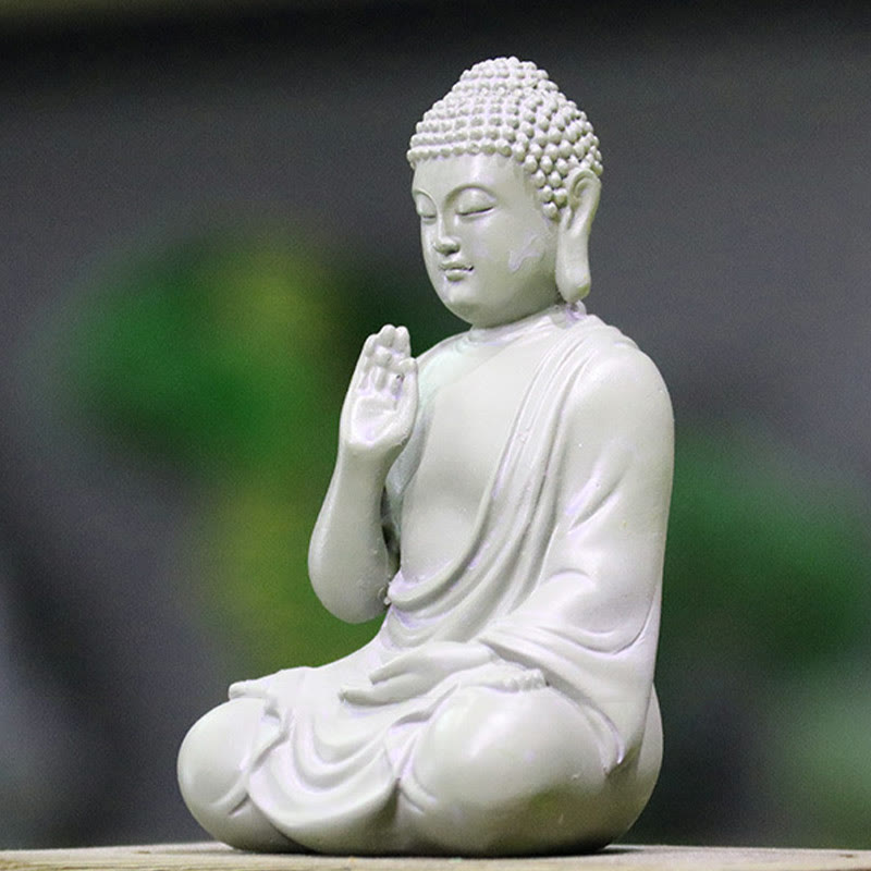 Small Meditation Prayer Resin Buddha Statue – three-quarter angle showing gentle face and prayer hand detail