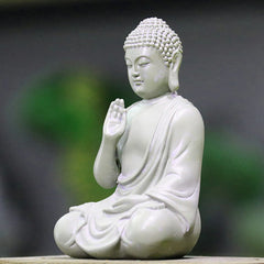 Small Meditation Prayer Resin Buddha Statue – three-quarter angle showing gentle face and prayer hand detail