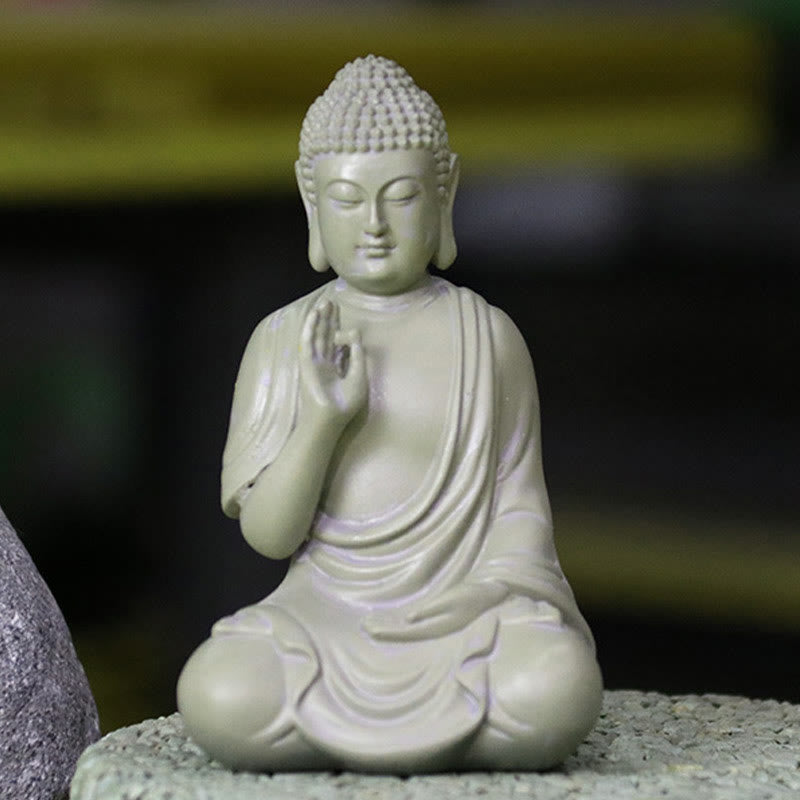Small Meditation Prayer Resin Buddha Statue – front view showing folded hands and closed eyes meditation expression