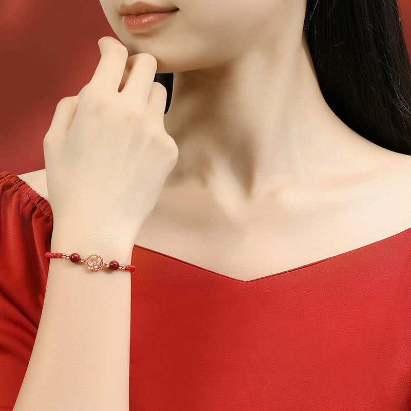 Silver Jade Cinnabar Koi Snake Bracelet – snake zodiac charm on wrist, model in red dress, lucky protection jewelry