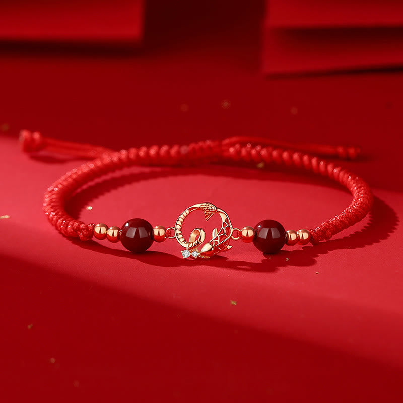 Silver Jade Cinnabar Koi Snake Bracelet – red string with gold koi charm and red beads on red bg, lucky cord jewelry