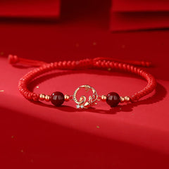 Silver Jade Cinnabar Koi Snake Bracelet – red string with gold koi charm and red beads on red bg, lucky cord jewelry