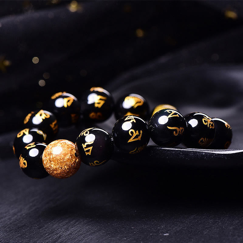 Rainbow Obsidian Mantra Bracelet - Textured gold accent bead with mantra-engraved obsidian, healing bracelet