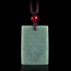 Formless Buddha Jade Square Amulet Necklace – back of jade square showing smooth polished surface and cord hole