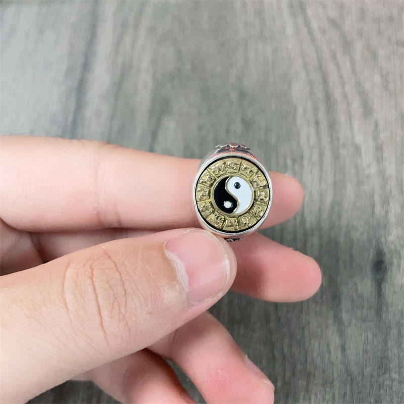 Yin Yang Chinese Zodiac Ring - adjustable ring held in hand showing open band, copper ring