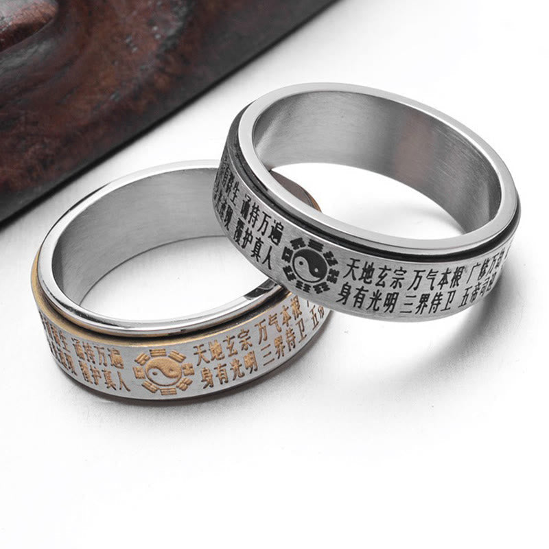 Bagua Yin Yang Titanium Steel Rotatable Ring - silver and gold variants with Taoist trigram engravings, rotatable meditati...