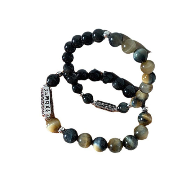 Black Obsidian Tiger Eye Bracelet – Two coiled bracelets on white background showing chatoyant stone beads, beaded jewelry