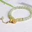 Hetian Jade Lotus Luck Bracelet - pale jade beads with gold lotus flower charm, balanced