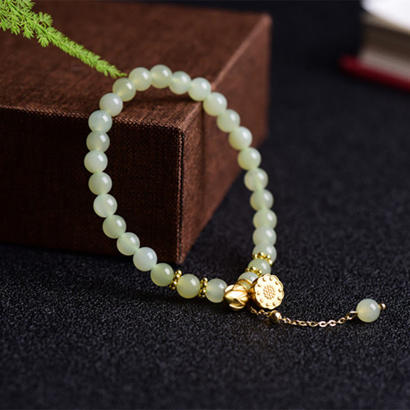 Hetian Jade Lotus Luck Bracelet - lotus flower and bud charms on velvet box, elegant
