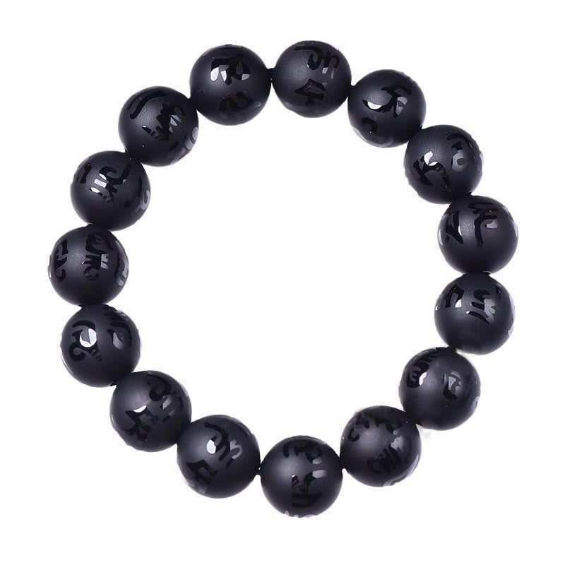 Black Onyx Mantra Bracelet – Top-down view showing circular layout of mantra-engraved beads, black onyx mala