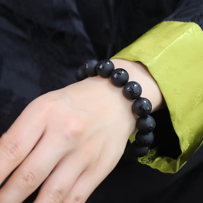 Black Onyx Om Mani Padme Hum Carved Bracelet Secondary image