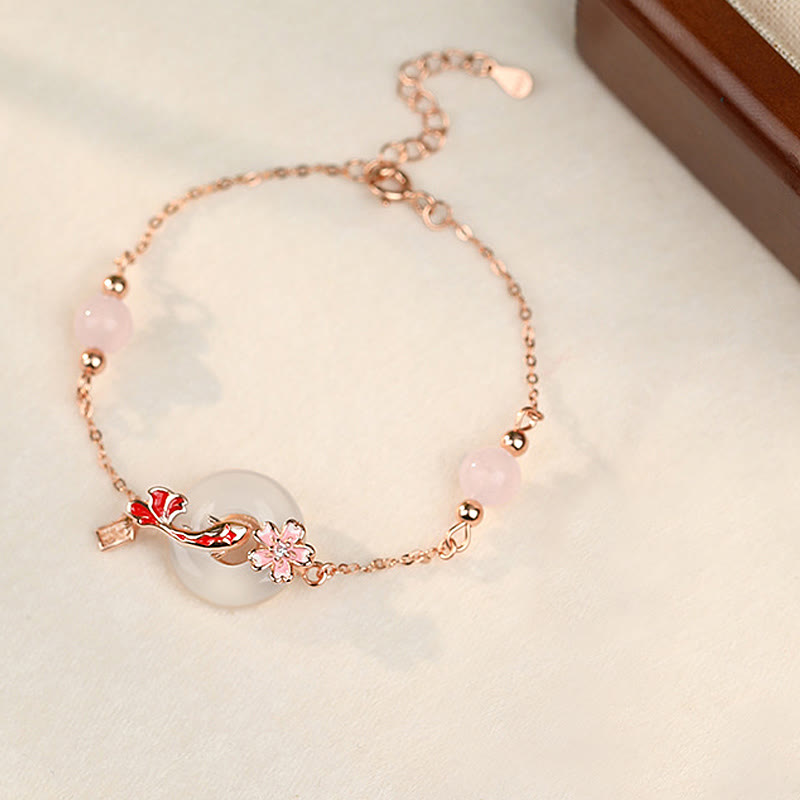 Chalcedony Koi Fish Peace Buckle Bracelet – top-down full bracelet with circular pendant, blossom charm and lobster clasp