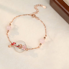 Chalcedony Koi Fish Peace Buckle Bracelet – top-down full bracelet with circular pendant, blossom charm and lobster clasp