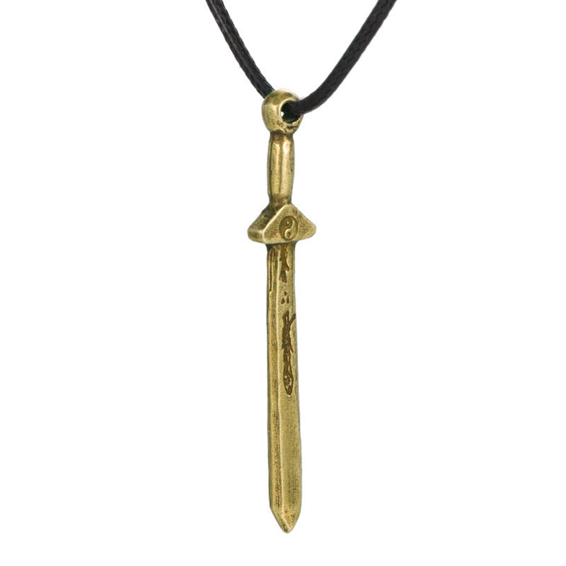 Vintage Yin Yang Copper Sword Necklace - front view of antiqued copper sword pendant with yin-yang symbol on black cord, p...