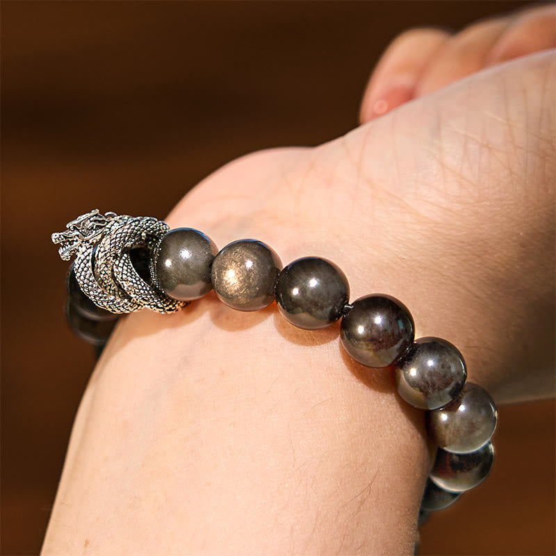Silver Sheen Obsidian Dragon Bracelet – side wrist shot showing golden sheen obsidian and dragon head clasp, clarity