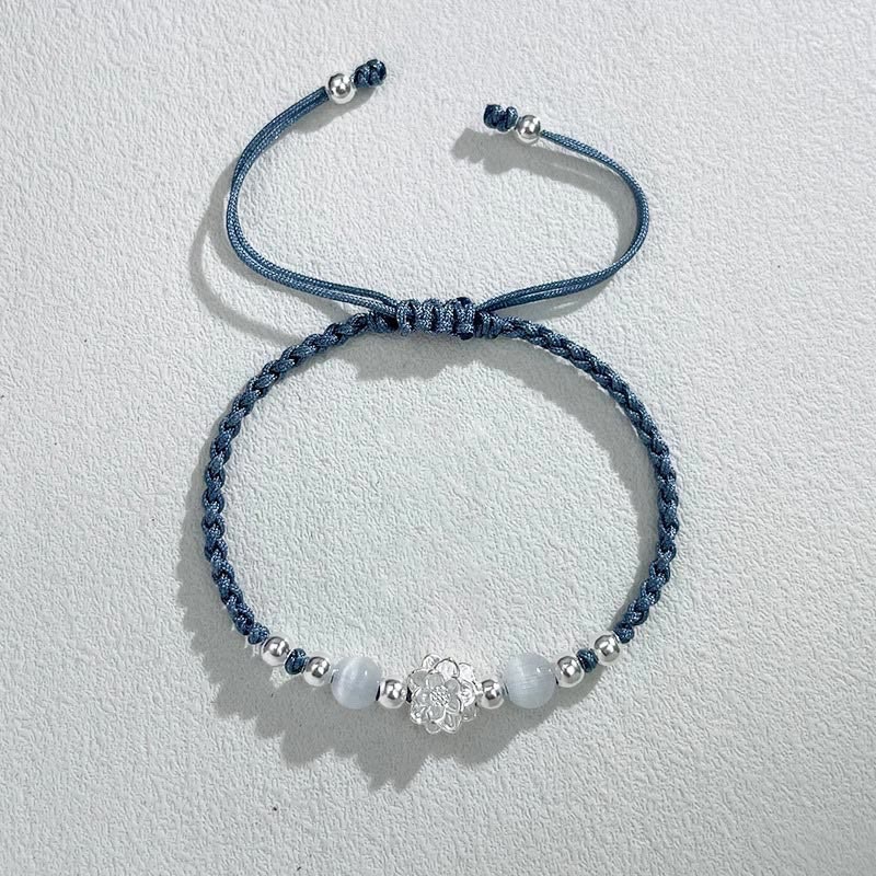 Sterling Silver Lotus Cat's Eye String Bracelet - denim blue cord with silver flower, serene elegance