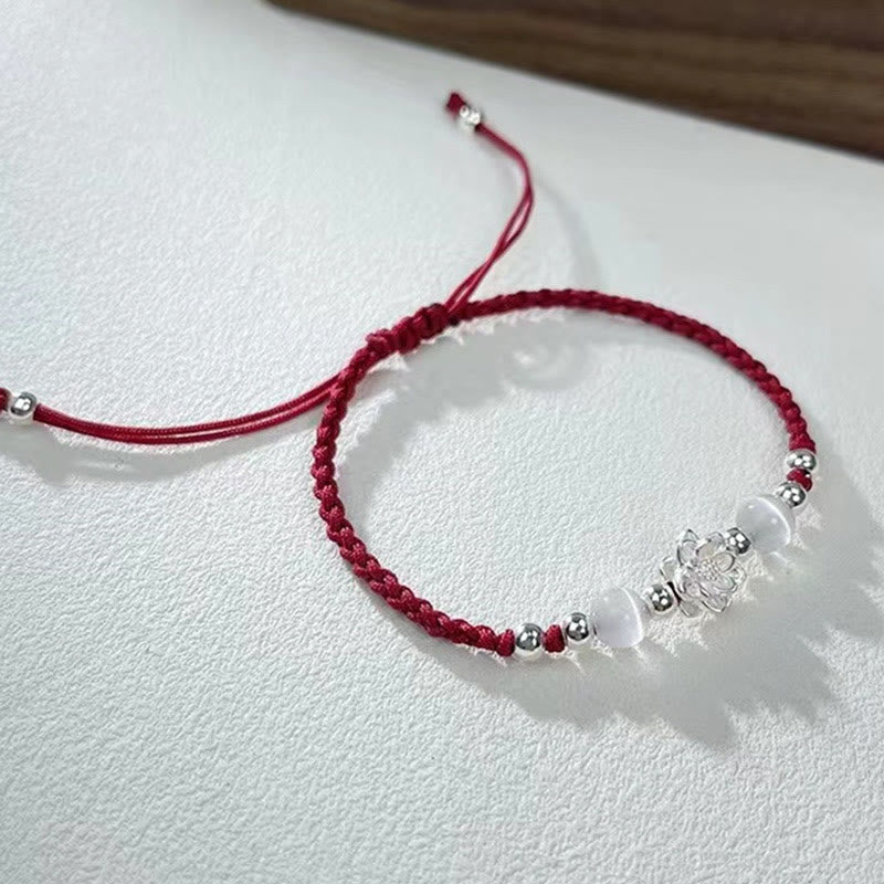 Sterling Silver Lotus Cat's Eye String Bracelet - deep red cord with silver lotus and opal beads, graceful