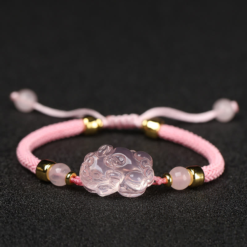 Pink Crystal PiXiu Bracelet – Pink braided cord with crystal PiXiu and gold bead accents