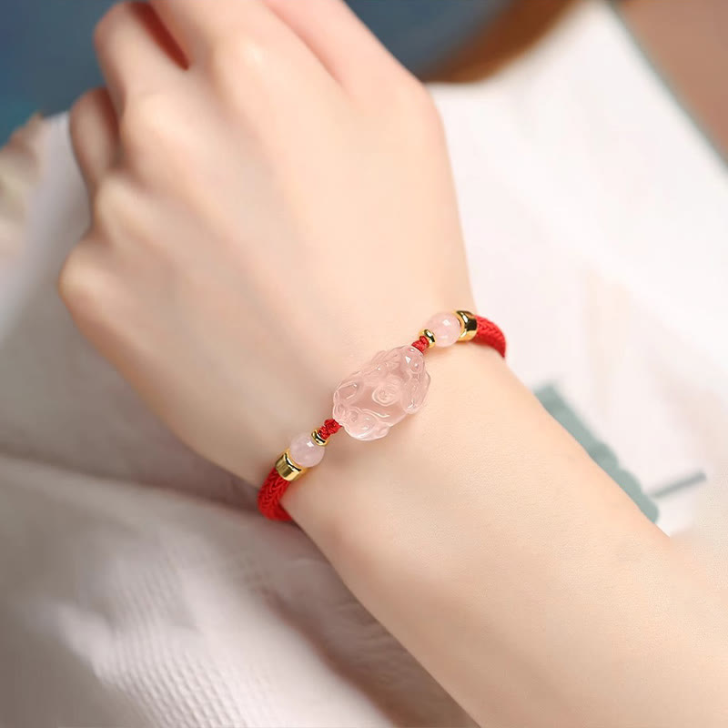 Pink Crystal PiXiu Bracelet – Worn on wrist with white blouse, red cord wealth love jewelry
