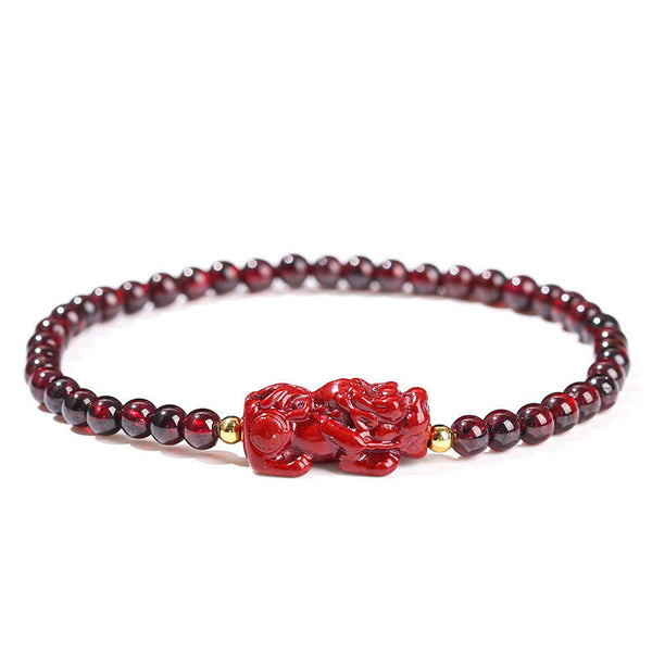 Garnet Cinnabar PiXiu Bracelet – front view white background red cinnabar PiXiu charm, strawberry quartz