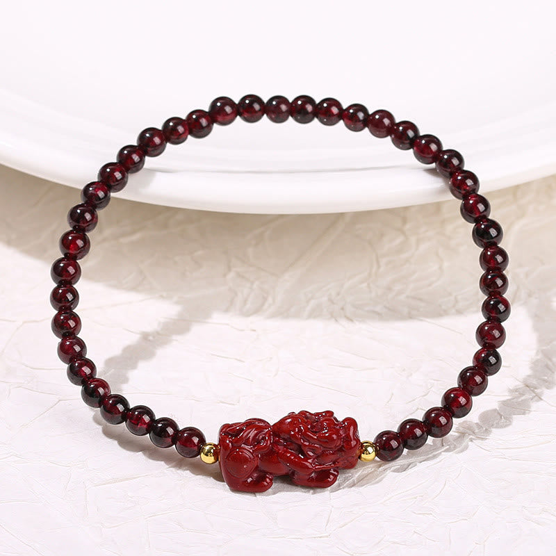 Garnet Cinnabar PiXiu Bracelet – garnet bracelet white textured background white plate stand, love crystal