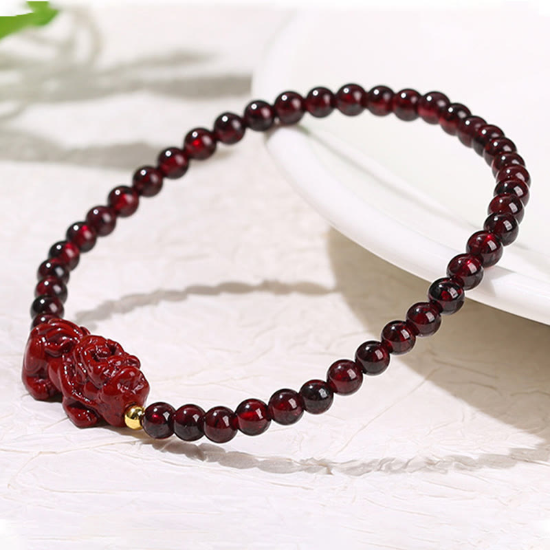 Garnet Cinnabar PiXiu Bracelet – white surface white vase green plant leaf lifestyle, garnet passion bracelet