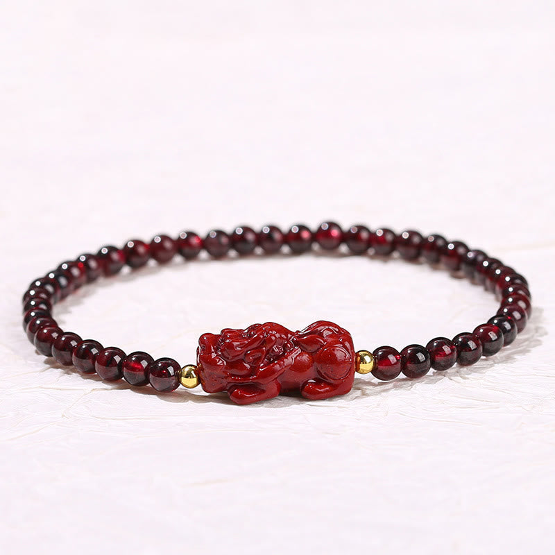 Garnet Cinnabar PiXiu Bracelet – front view centered white background red PiXiu gold beads, FengShui love