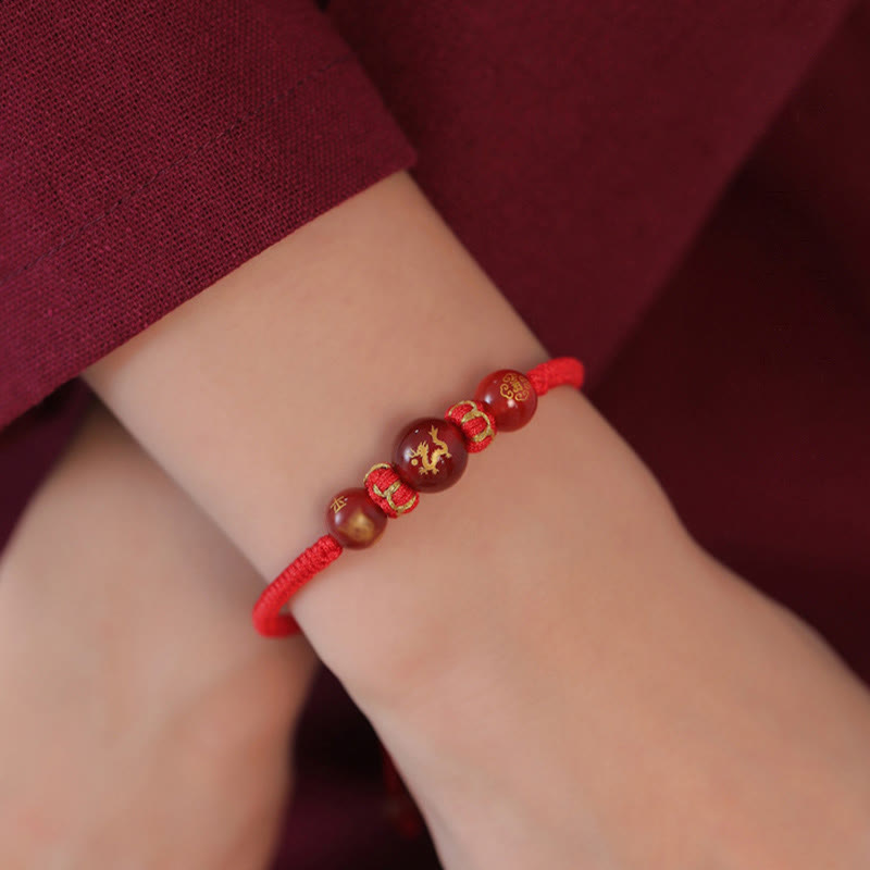 Red Agate Chinese Zodiac Red String Braided Bracelet | Protection – Dragon agate on wrist with gold knots, bold style