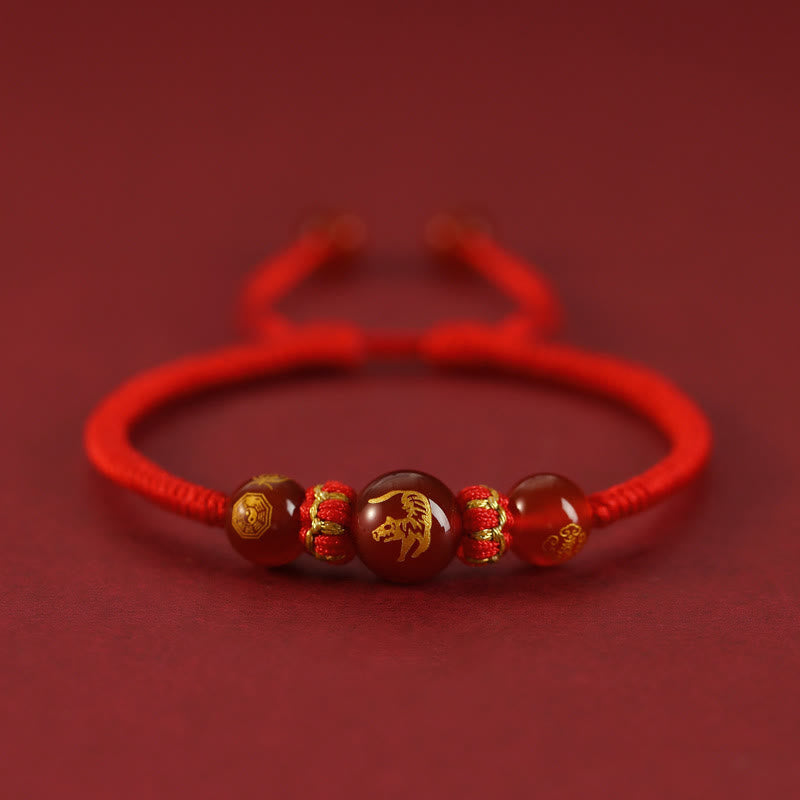 Red Agate Chinese Zodiac Red String Braided Bracelet | Protection – front view Horse agate bead on red cord, spiritual amulet