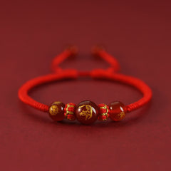 Red Agate Chinese Zodiac Red String Braided Bracelet | Protection – front view Horse agate bead on red cord, spiritual amulet