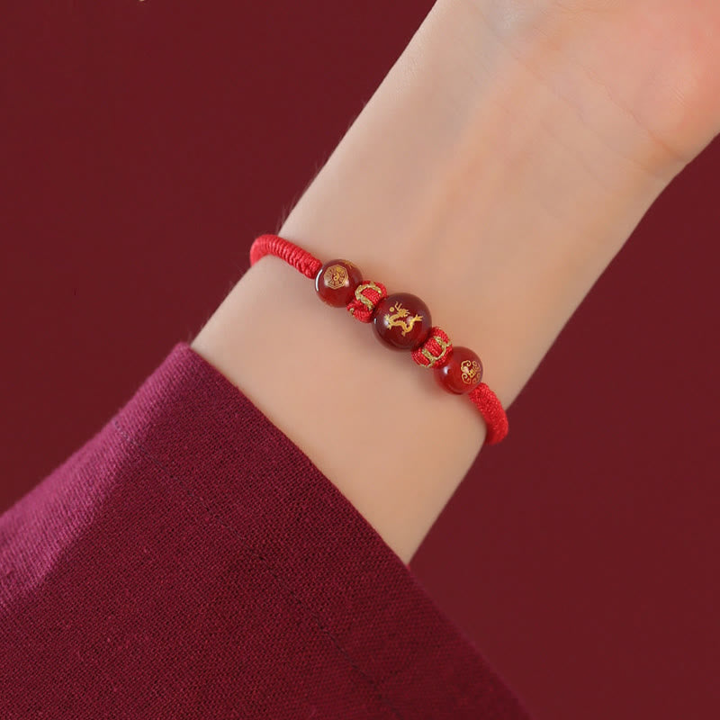 Red Agate Chinese Zodiac Red String Braided Bracelet | Protection – gold Dragon on braided cord, wrist protection