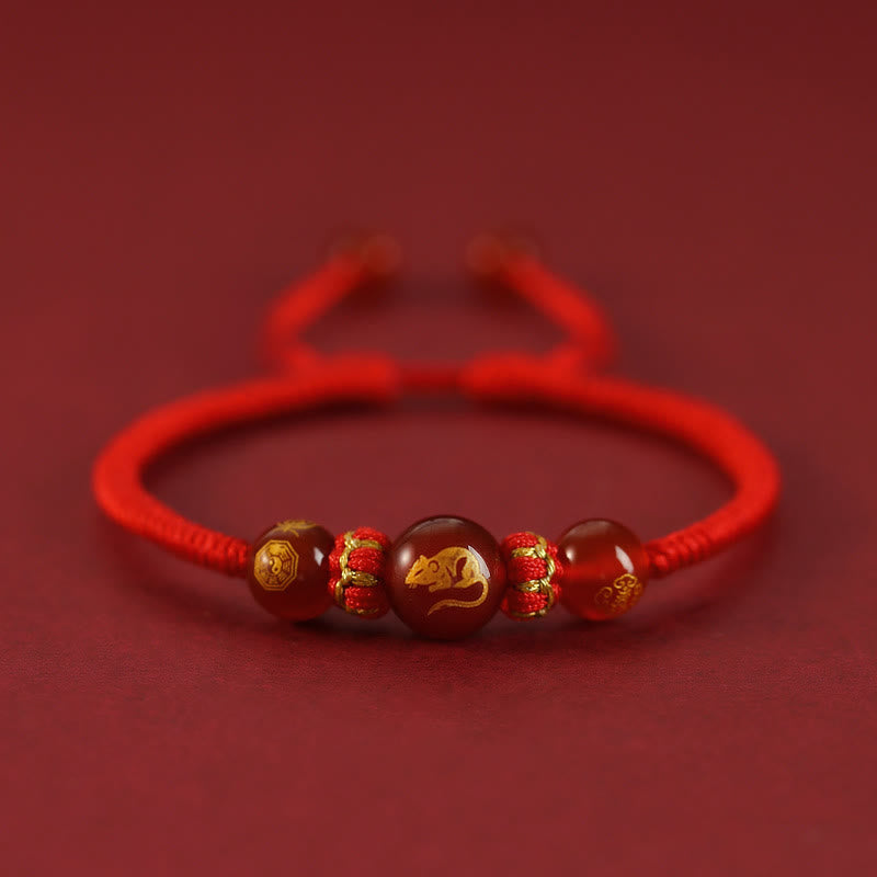 Red Agate Chinese Zodiac Red String Braided Bracelet | Protection – gold Rat zodiac charm on braided red string, fortune
