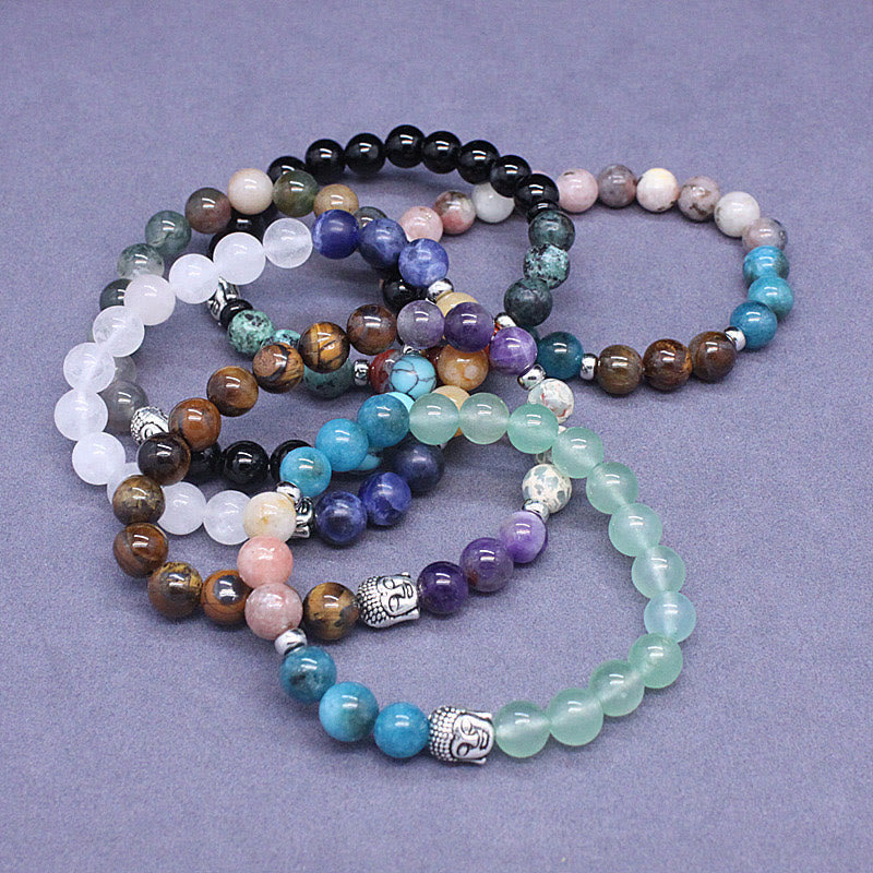 Mixed Gemstone Buddha Head Bracelet – six color variants in grid layout, full collection overview flat lay