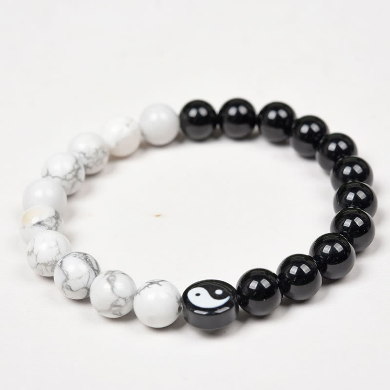 Obsidian White Turquoise Yin Yang Bracelet - circular layout of black obsidian and white howlite beads with yin-yang focal...