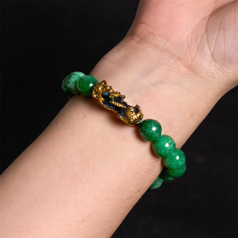 PiXiu Jade Bracelet – Wrist model on black background, green jade protection bracelet