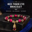 Red Tiger Eye PiXiu Fox Bracelet – Red tiger eye crystal gold PiXiu on black stone banner, protection
