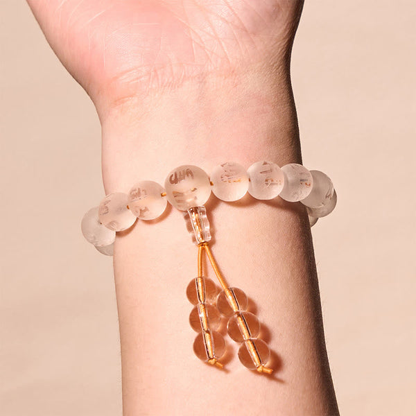 Om Mani Padme Hum Bracelet - Frosted mantra beads worn on wrist with crystal tassel, meditation jewelry
