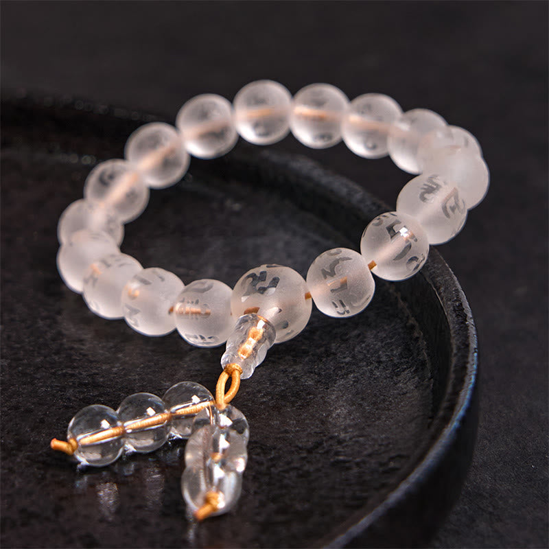 White Crystal Mantra Bracelet – Etched Tibetan characters on frosted beads, golden cord tassel
