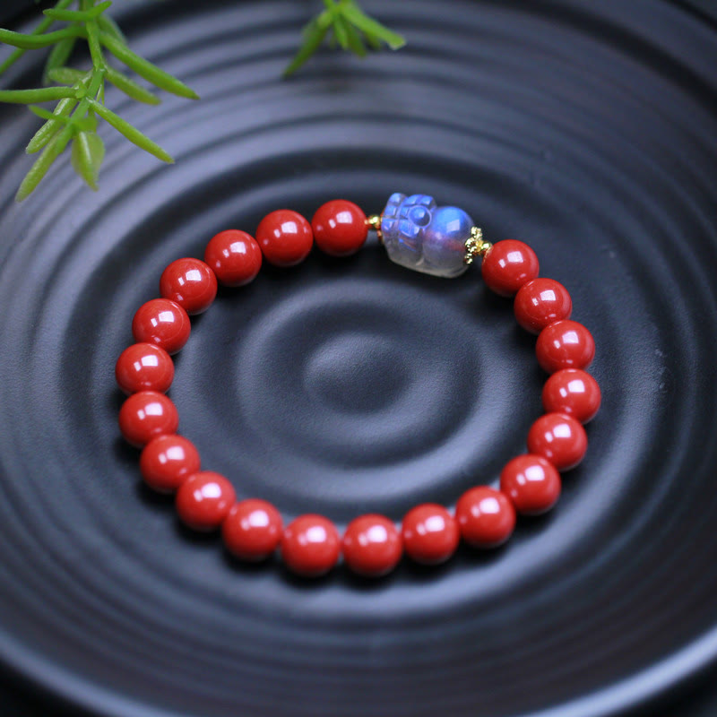 Cinnabar Moonstone PiXiu Bracelet – Red beads blue PiXiu on black ripple plate green plant, zen