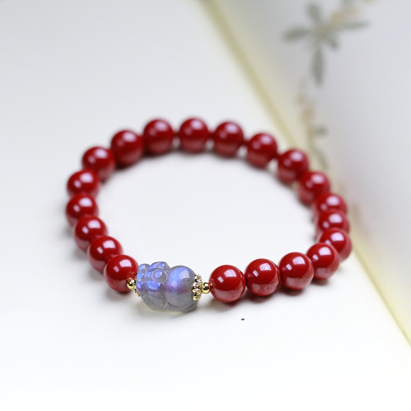 Cinnabar Moonstone PiXiu Bracelet – Red cinnabar beads blue moonstone PiXiu white bg, calm wealth