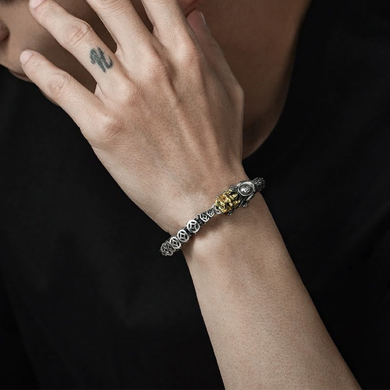 Sterling Silver PiXiu Coins Bracelet – Silver PiXiu bangle on wrist close-up, men's spiritual jewelry