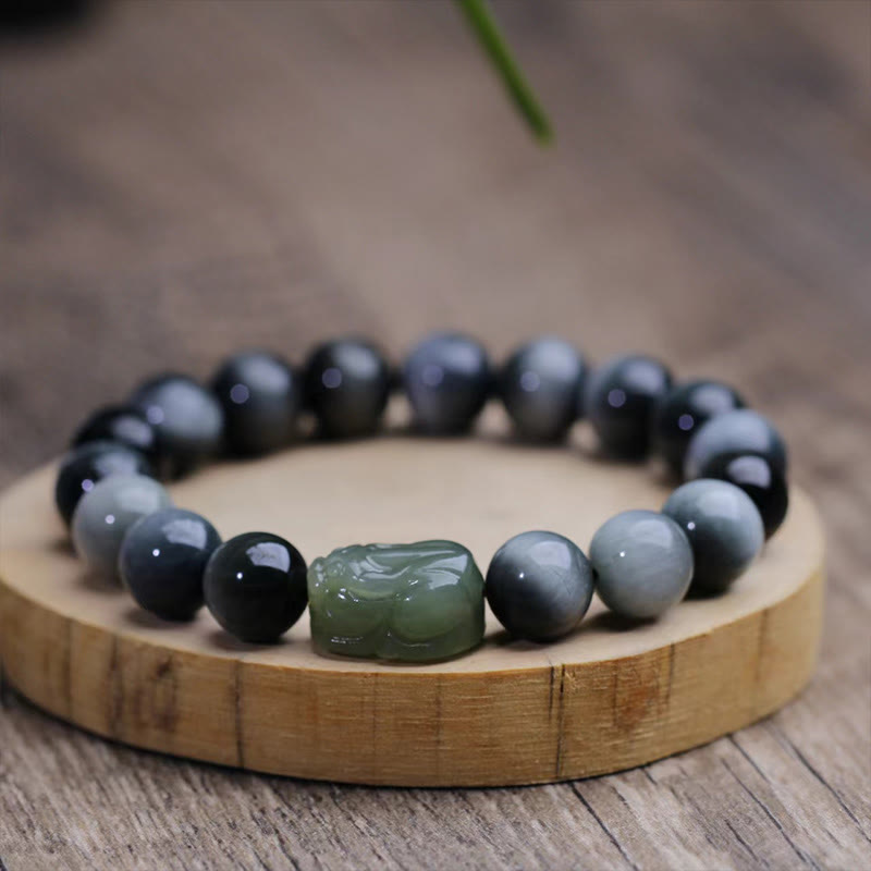 Eagle's Eye Jade PiXiu Bracelet – bracelet on round wood slice, gray-blue beads with green PiXiu, natural