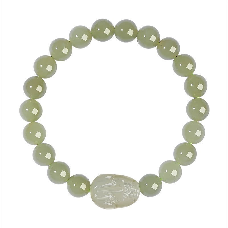 Hetian Jade PiXiu Bracelet – light green jade bracelet on white background, clean studio top view